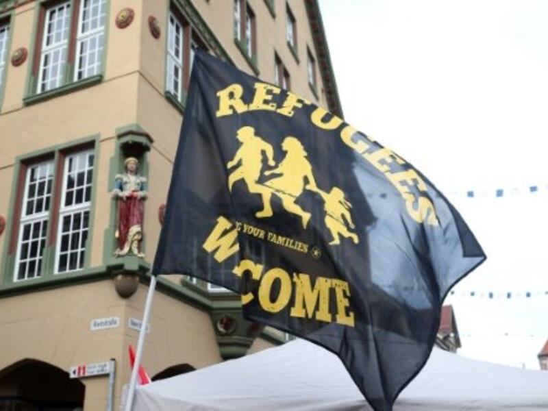 A flag reading "Refugees Welcome" is seen at a demonstration in Villingen-Schwenningen, southern Germany, on January 30, 2016. (AFP/File)