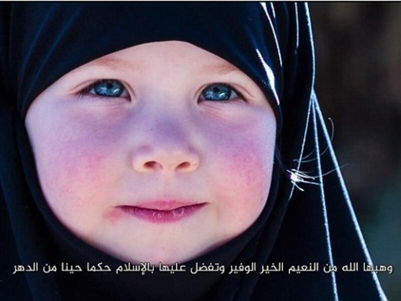 A young Chechen girl featured in a Daesh propaganda video. (Screenshot)
