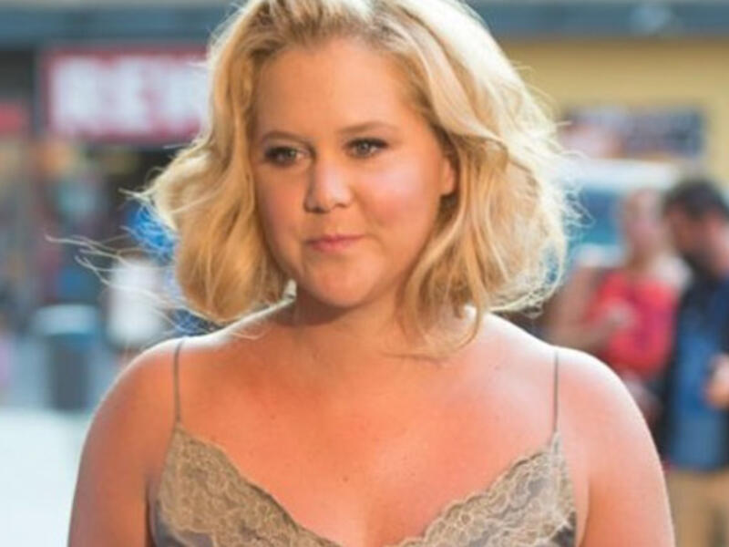 she is expecting her first child with husband Chris Fischer (Source: amyschumer / Instagram)  she is expecting her first child with husband Chris Fischer (Source: amyschumer / Instagram)