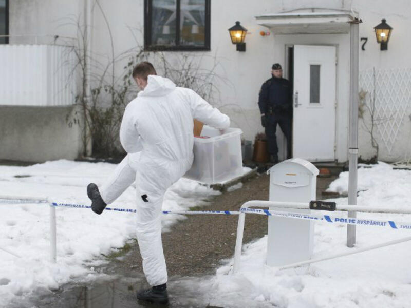 Police investigators are seen outside a home for juvenile asylum seekers in Molndal in southwestern Sweden on Jan. 25, 2016. A 22 year old female employee was killed in a knife attack at the center for migrant youths. (AFP/Adam Ihse)