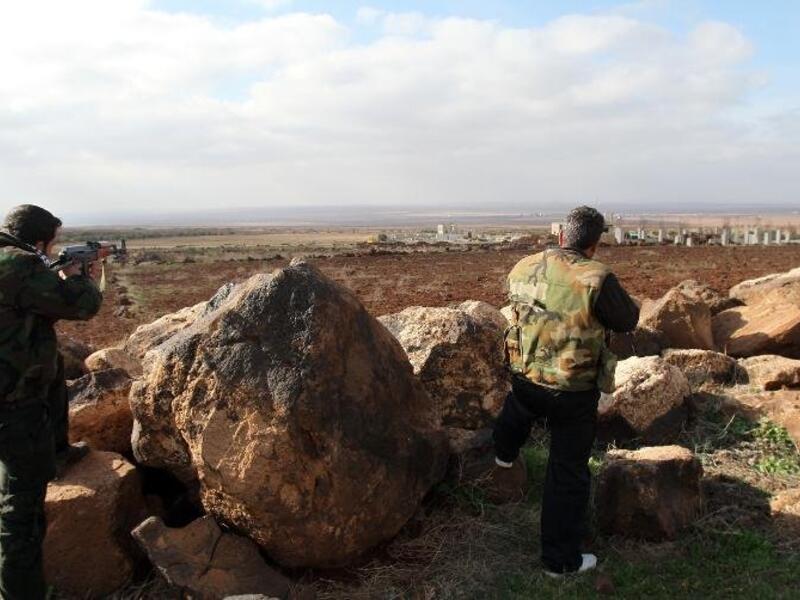 Syrian rebels captured an army base in Daraa after launching a 24-hour operation against the regime's 52nd Brigade. (AFP/Anwar Amro)