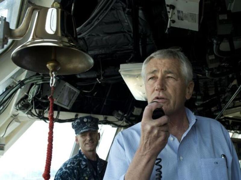 US Secretary of Defense Chuck Hagel addresses the crew of the USS Freedom (AFP/ US Department of Defense)