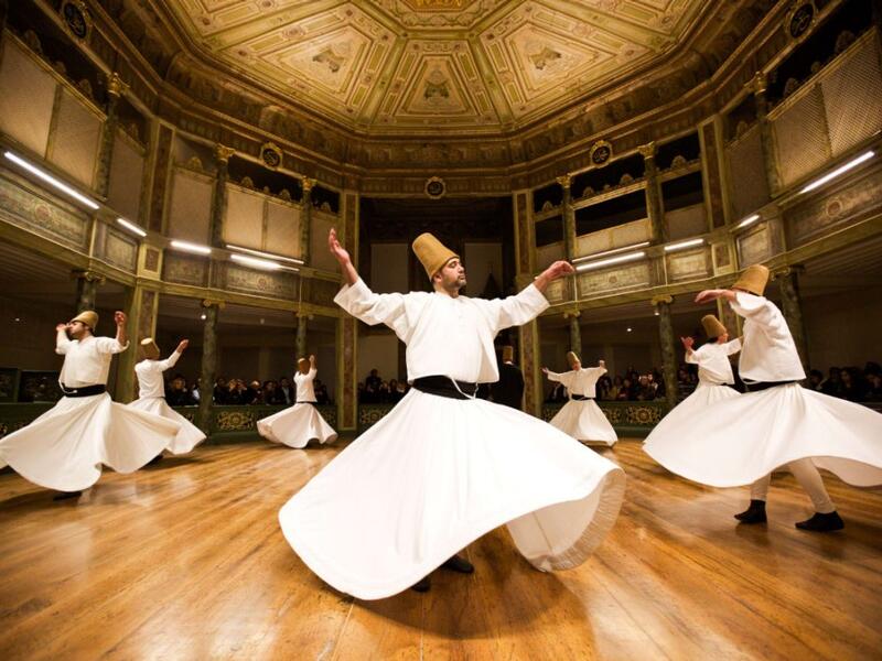 Whirling dervishes, members of the mystical Sufi tradition of Islam that 13th-century Persian poet Jalaluddin Rumi belonged to, perform their prayers in Istanbul.  (AFP/Gurcan Ozturk)