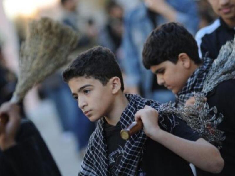 As the story goes, the women and children left living were made prisoners and transported to Yazid's court in Damascus: Perhaps
giving added incentive for women and children ever since to play a role in Ashura (though predominantly a male affair). 