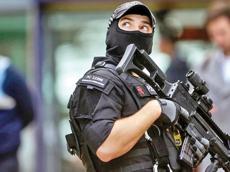 An armed police officer at Manchester Piccadilly railway station (AFP/File Photo)	
