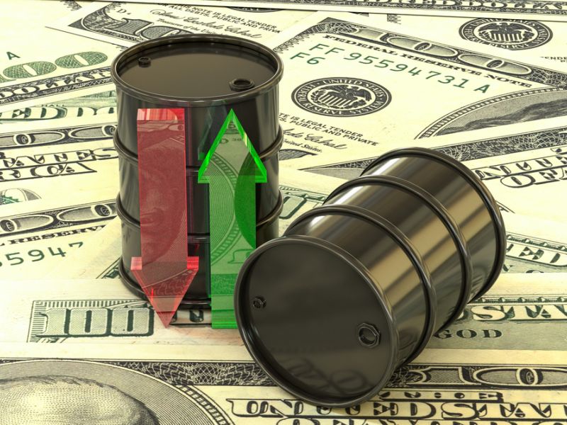 Oil prices hit 2-week high, US dollar little changed