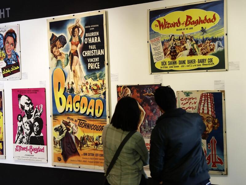  In a Beirut cultural centre, Lebanese film buff Abboudi Abu Jawdeh is exhibiting vintage film posters from his collection that show off a lost art, but also offer insight into decades of Western cliches of the Arab world. JOSEPH EID / AFP