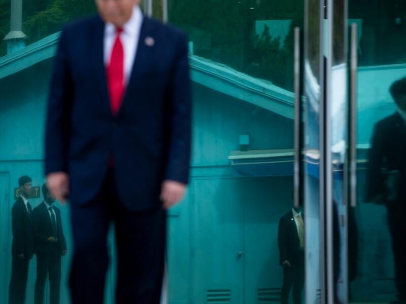 US President Donald Trump leave Freedom House before walking to the line of demarcation to meet North Korea's leader Kim Jong-un in the Demilitarized Zone(DMZ) on June 30, 2019, in Panmunjom, Korea.  Brendan Smialowski / AFP