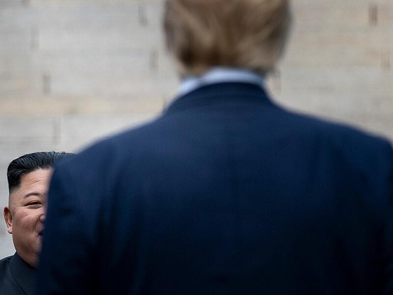 US President Donald Trump waits at the line of demarcation for North Korea's leader Kim Jong-un in the Demilitarized Zone(DMZ) on June 30, 2019, in Panmunjom, Korea.  Brendan Smialowski / AFP