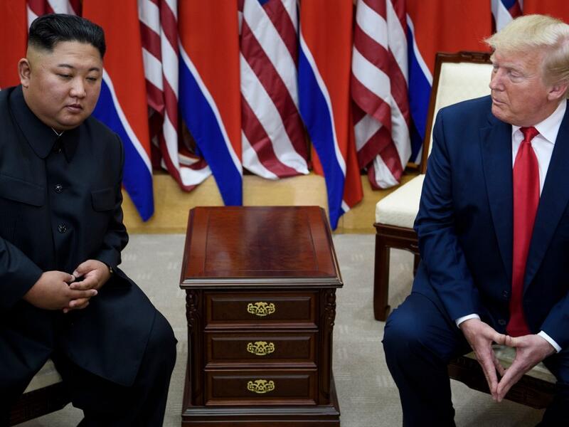 North Korea's leader Kim Jong-un and US President Donald Trump before a meeting in the Demilitarized Zone (DMZ) on June 30, 2019, in Panmunjom, Korea.  Brendan Smialowski / AFP