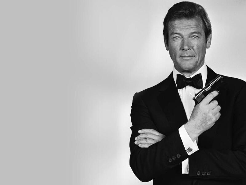 روجر مور: قدم شخصية بوند في 7 أفلام بين عامي 1973 و1985، وكان أولها فيلم "عش ودعهم يموتون/ Live and Let Die" الذي حقق نجاحًا باهرًا.