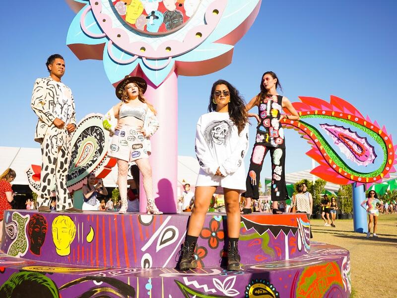 Festival goers attend the 2019 Coachella Valley Music And Arts Festival - Weekend 2 on April 21, 2019 in Indio, California. Presley Ann/Getty Images for Coachella/AFP