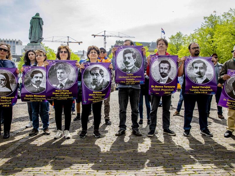 Protesters take part in a demonstration called by the Samenwerkende Armeense Organisatie (Cooperating Armenian Organization) to ask for the recognition of the Armenian genocide that took place 104 years ago, in the Hague, on April 23, 2019.  Bart Maat / ANP / AFP