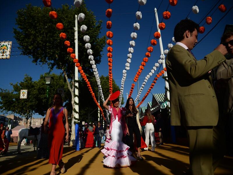 The fair dates back to 1847 when it was originally organized as a livestock fair but has turned into a week of flamenco dancing, music and bullfighting.  CRISTINA QUICLER / AFP