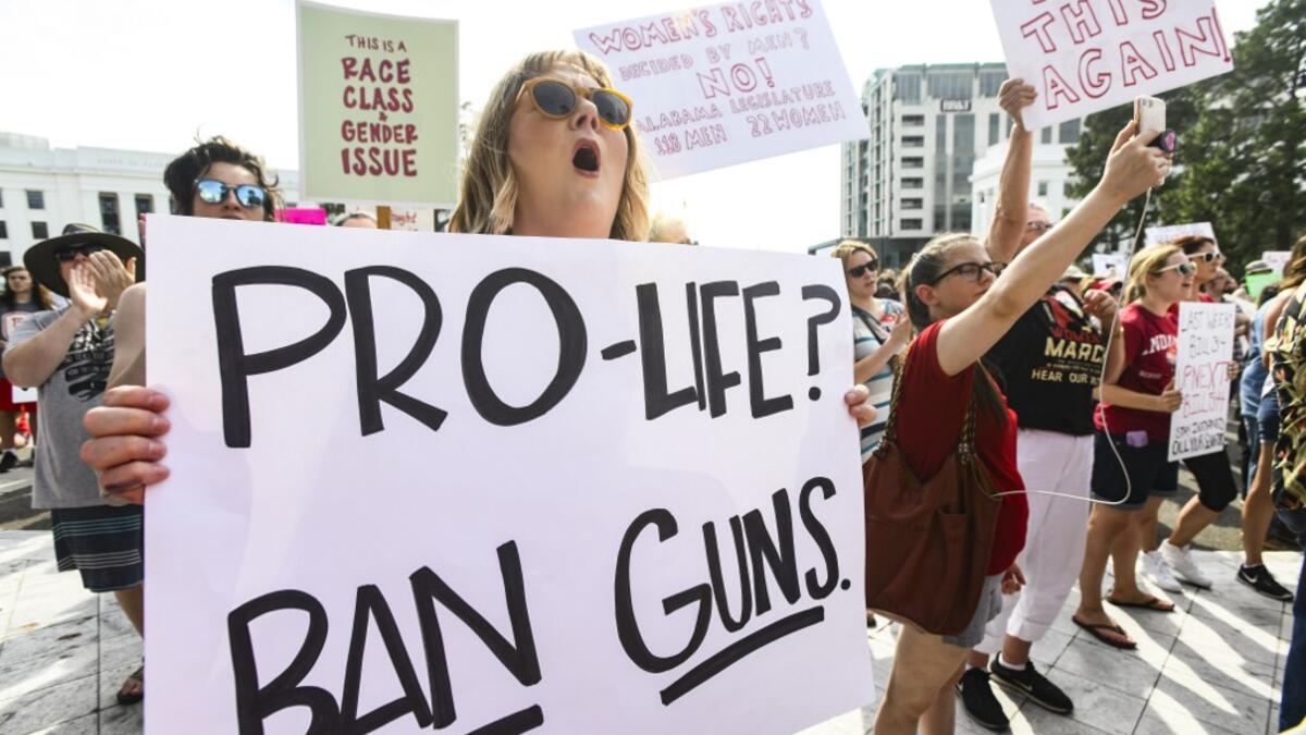 Demonstrators gathered to protest HB 314, a bill passed by the Alabama Legislature last week making almost all abortion procedures illegal. Julie Bennett/Getty Images/AFP