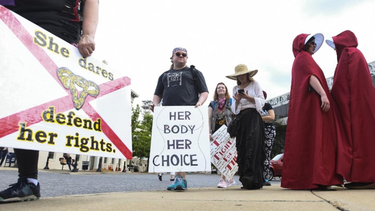 Protestors prepare to participate in a rally against one of the nation's most restrictive bans on abortions on May 19, 2019 in Montgomery, Alabama. Julie Bennett/Getty Images/AFP