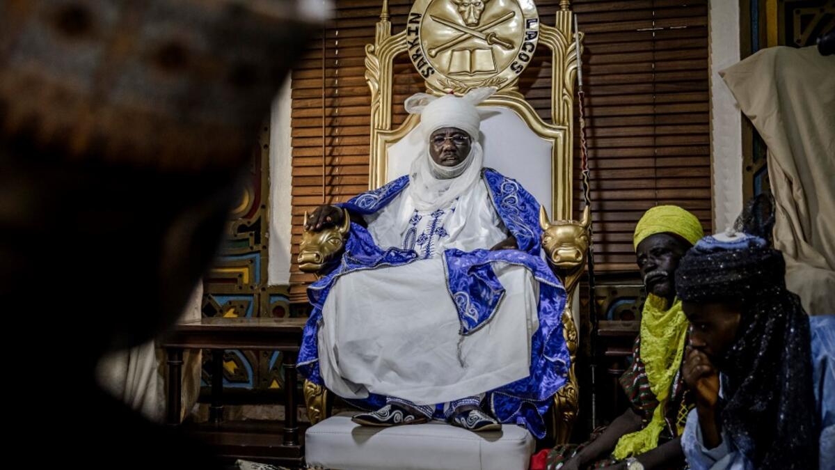 Mohammed Abubakar Bambado, the Sarkin Fulani of Lagos, sits on his throne while presiding over an assembly with Fulani people looking for his advice in his Palace at the district of Surulere in Lagos, Nigeria on April 28, 2019. Luis TATO / AFP