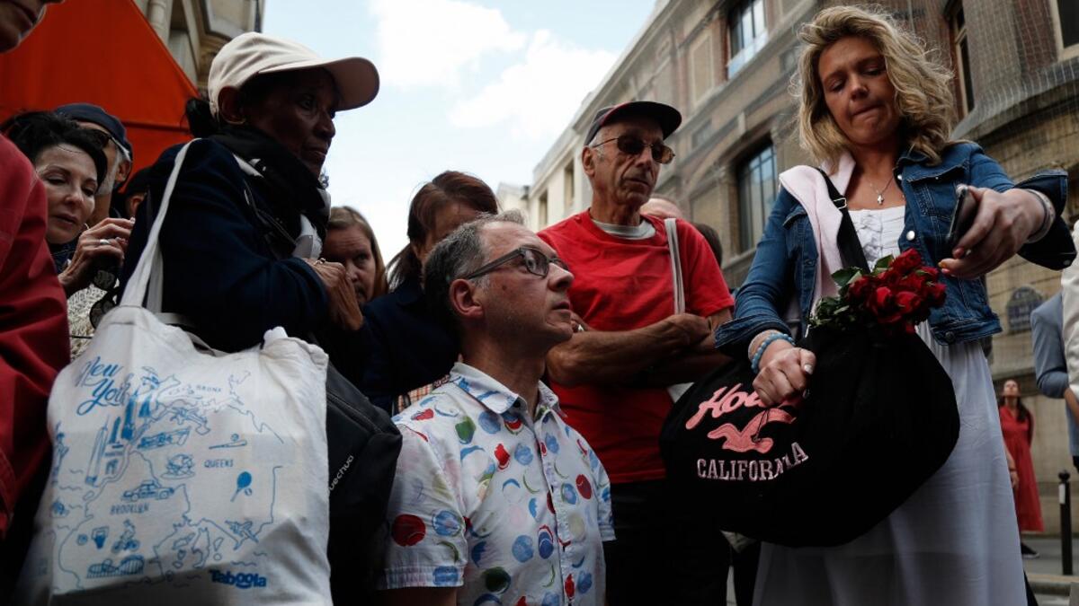 For safety reasons, the mass led by Archbishop of Paris Michel Aupetit will be celebrated on a very small scale. Worshippers will be expected to don hard hats but priests will be wearing their ceremonial garb.  Zakaria ABDELKAFI / AFP