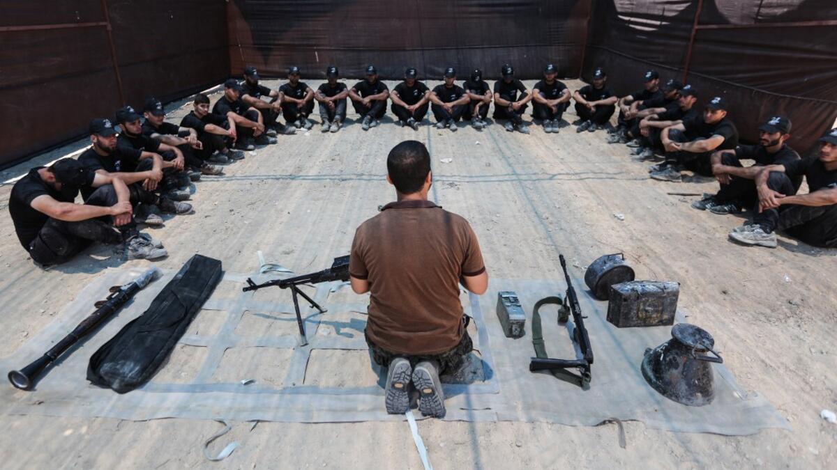 Palestinian military cadets take part in a training session organised by Hamas' military wing, the Ezzedin al-Qassam Brigades, in Gaza City on July 20, 2019.  MAHMUD HAMS / AFP