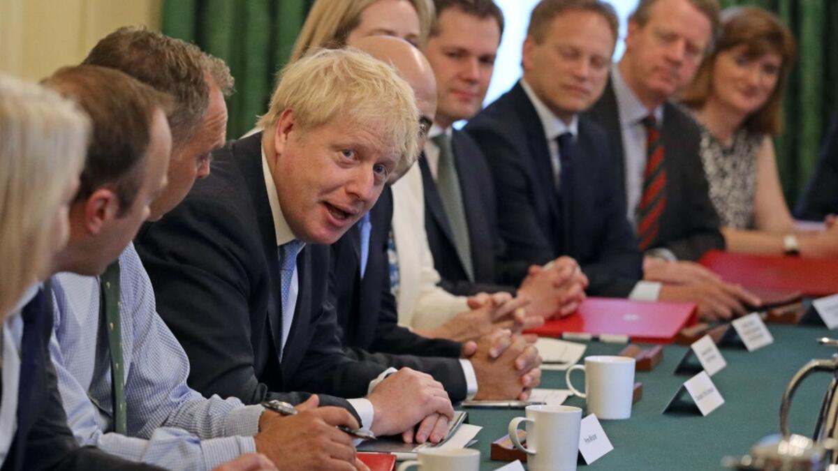 Britain's Prime Minister Boris Johnson (C) holds his first Cabinet meeting at 10 Downing Street in London on July 25, 2019. Britain's newly installed Prime Minister Boris Johnson held his first cabinet meeting today faced with the burning challenge of resolving the three-year Brexit crisis in three months. Aaron Chown / POOL / AFP