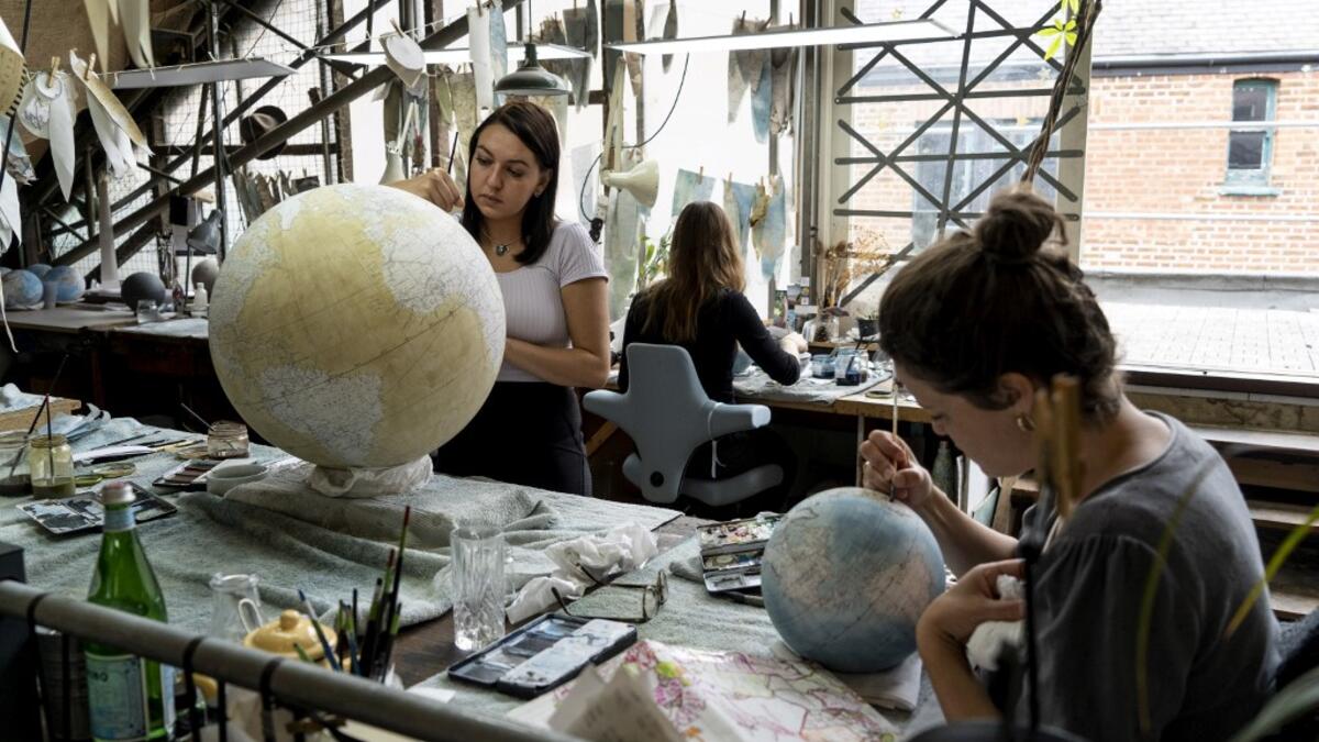 In 2008, Peter Bellerby set out to buy his father a high quality handmade globe as an 80th birthday present. When he could not find one, the Briton decided to make it himself -- and, in the process, catapulted himself into a new profession.  Niklas HALLE'N / AFP