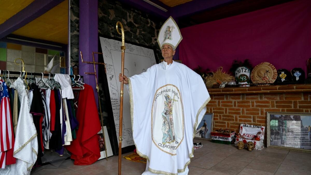 Julia Klug, an activist who has made her outfits for demonstrations for over two decades motivated by her heartbreaking story. RODRIGO ARANGUA / AFP
