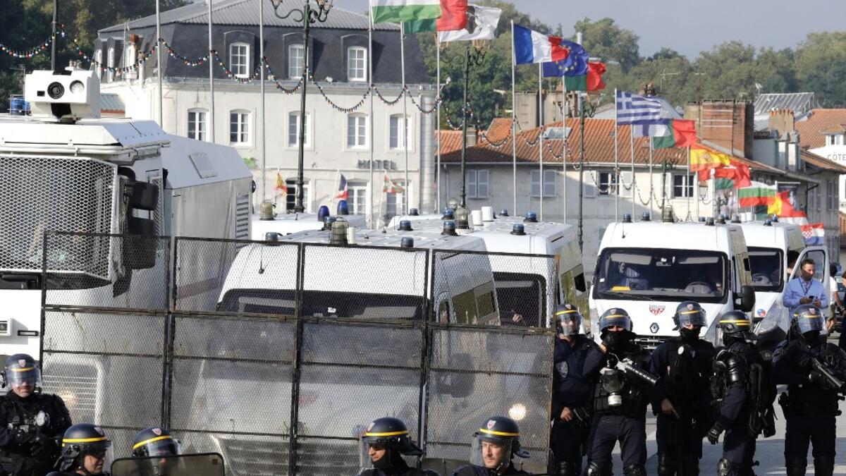 More than 9,000 anti-G7 protesters joined a mass march across the French-Spanish border as world leaders arrived for a summit in Biarritz just hours after activists clashed with police. Thomas SAMSON / AFP