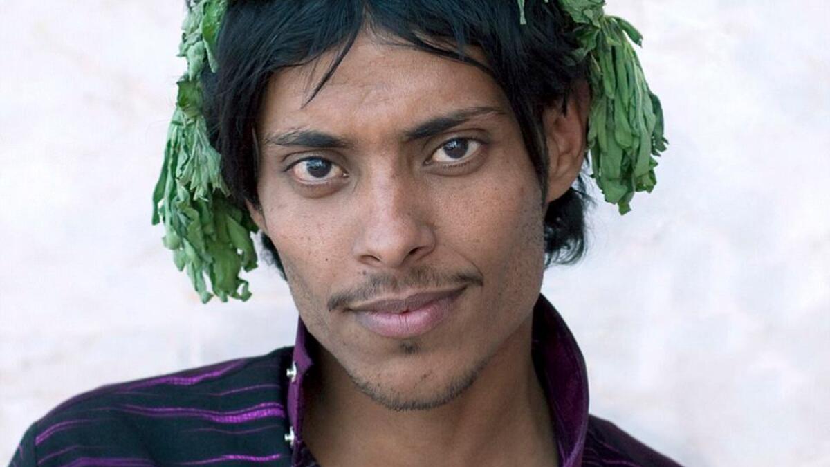 The men rarely see outsiders and locals reacted excitedly when Lafforgue first arrived, with this man calling his friends to tell them (Facebook)