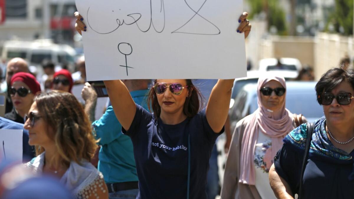 Palestinian women protest in support of women’s rights outside the prime minister’s office in the West Bank city of Ramallah on September 2, 2019, after a young Palestinian died in a case that has raised emotions.  ABBAS MOMANI / AFP