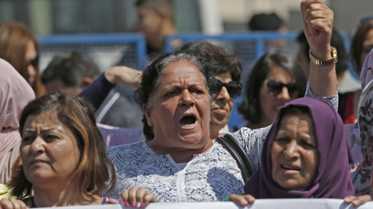Palestinian women protest in support of women’s rights outside the prime minister’s office in the West Bank city of Ramallah on September 2, 2019, after a young Palestinian died in a case that has raised emotions. ABBAS MOMANI / AFP