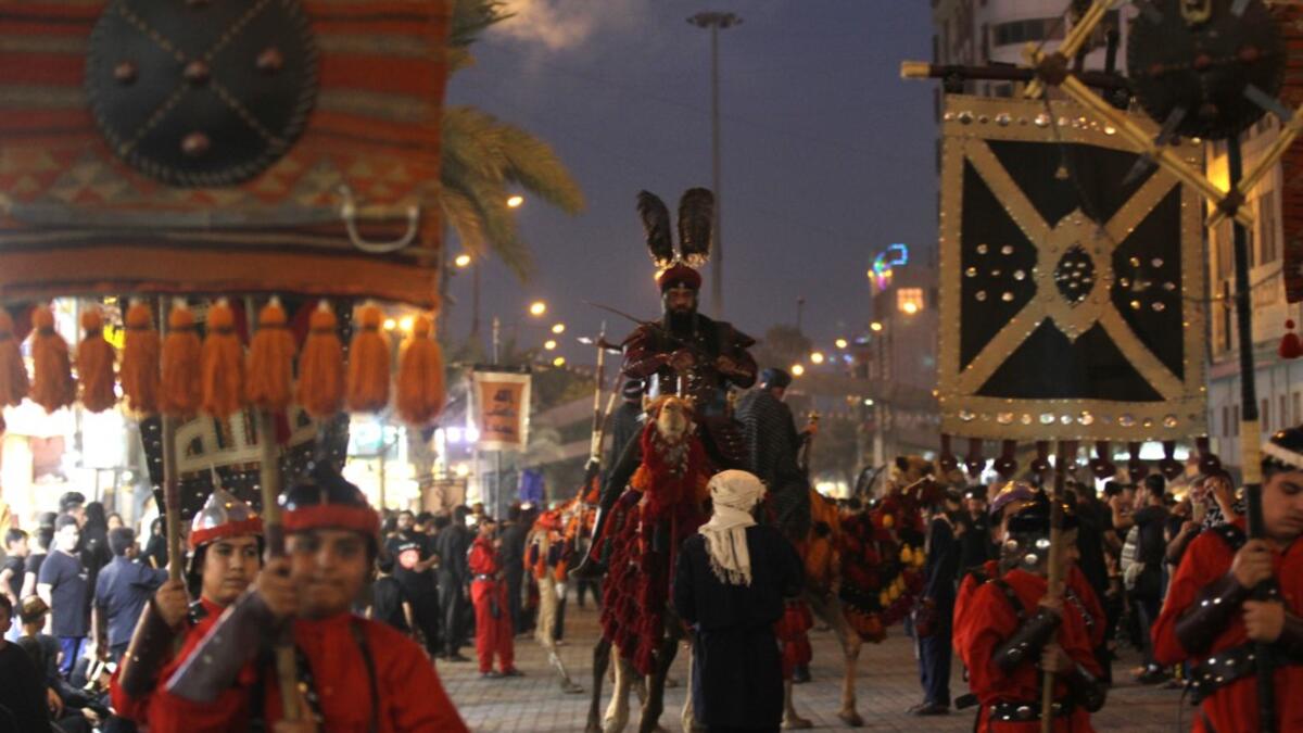 The religious commemoration of Ashura, which includes a ten-day mourning period starting on the first day of Muharram on the Islamic calendar, commemorates the seventh-century slaying of Prophet Mohammed's grandson Imam Hussein in Karbala. Ahmad AL-RUBAYE / AFP