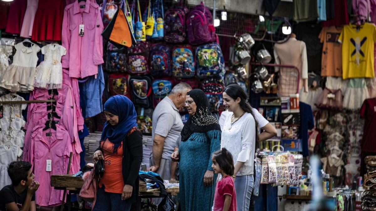 The civil war has battered the country's finances and depleted its foreign reserves. A flurry of international sanctions on President Bashar al-Assad's regime and associated businessmen since the start of the war in 2011 has compounded the situation. Delil SOULEIMAN / AFP