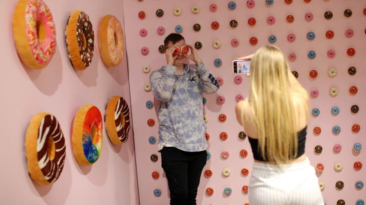 The Selfie Factory - the brainchild of Will Bower -- is near the end of its six-week run at Westfield London, one of Europe's biggest shopping centres. In that time, thousands have passed through the 20-odd themed booths and backdrops for quirky images to upload on their social media. Isabel INFANTES / AFP
