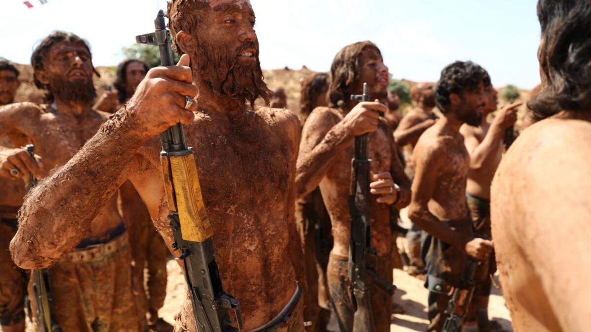 Turkish-backed fighters from al-Mutasim Brigade take part in a training at a camp near the Syrian town of Marea in the northern Aleppo district, on September 12, 2019. Nazeer Al-khatib / AFP
