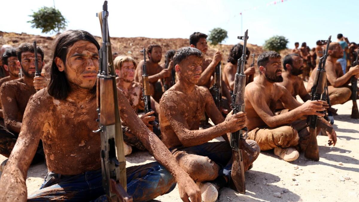 Turkish-backed fighters from al-Mutasim Brigade take part in a training at a camp near the Syrian town of Marea in the northern Aleppo district, on September 12, 2019. Nazeer Al-khatib / AFP