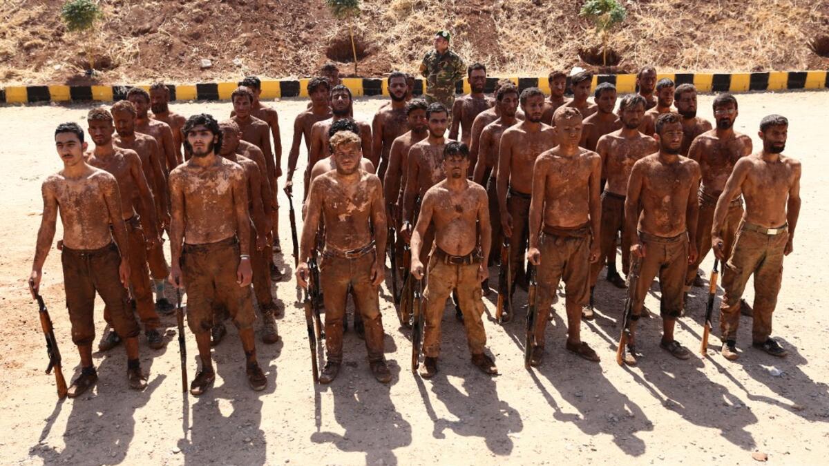 Turkish-backed fighters from al-Mutasim Brigade take part in a training at a camp near the Syrian town of Marea in the northern Aleppo district, on September 12, 2019. Nazeer Al-khatib / AFP