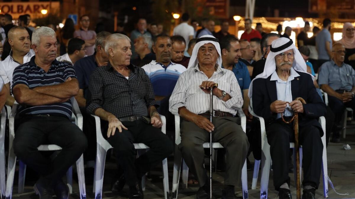 Supporters of the mainly Arab Joint List alliance attend an electoral campaign rally in the northern Arab-Israeli town of Sakhnin on September 15, 2019. Ahmad GHARABLI / AFP