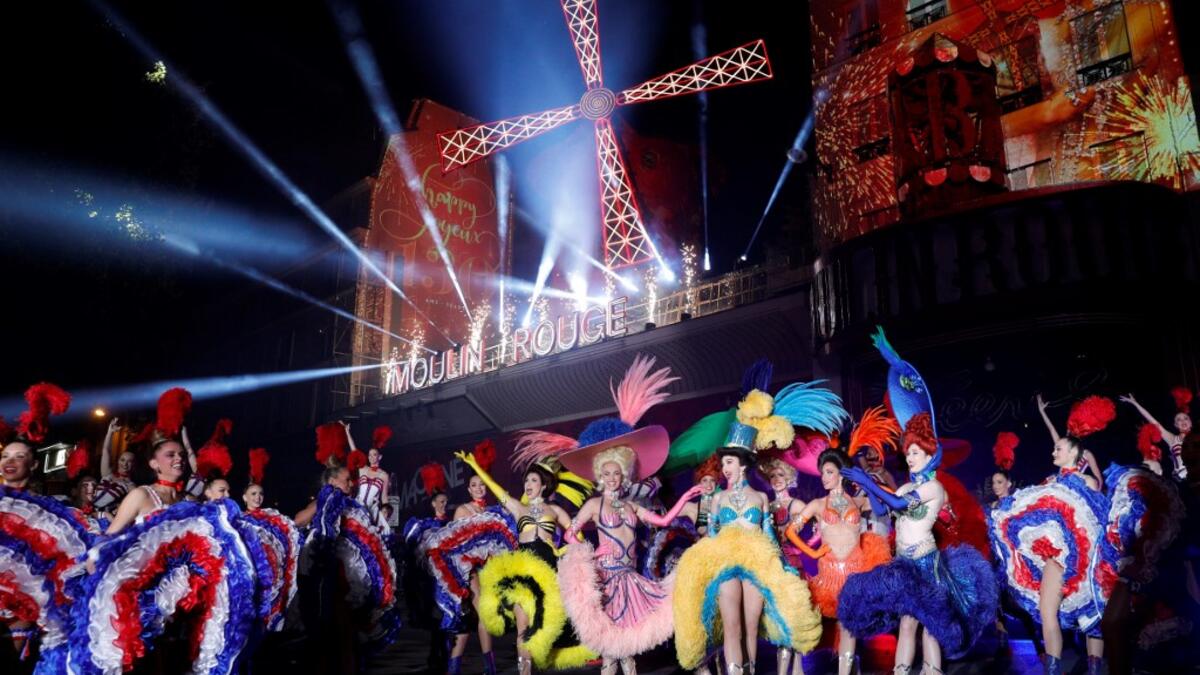 Moulin Rouge dancers perform during the celebration of the 130th anniversary of the French oldest cabaret, on October 6, 2019 in Paris.  GEOFFROY VAN DER HASSELT / AFP
