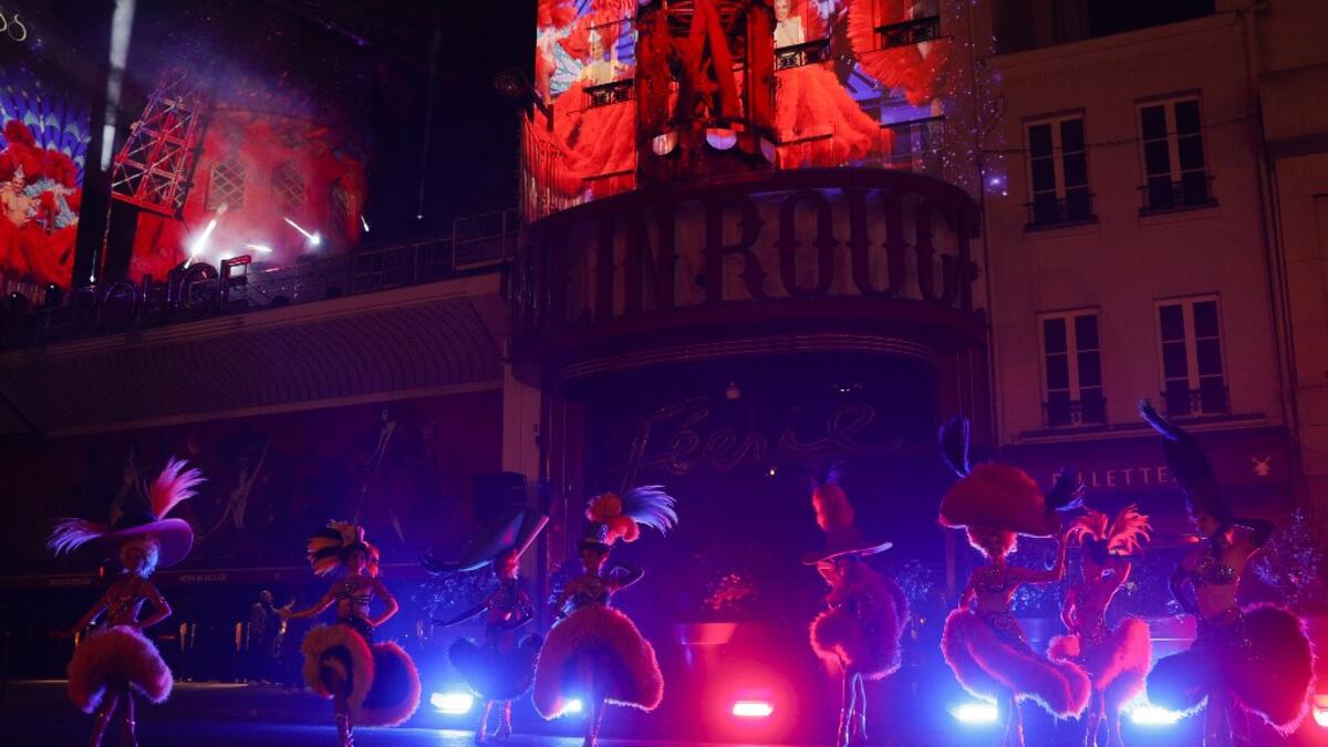 Moulin Rouge dancers perform during the celebration of the 130th anniversary of the French oldest cabaret, on October 6, 2019 in Paris.  GEOFFROY VAN DER HASSELT / AFP