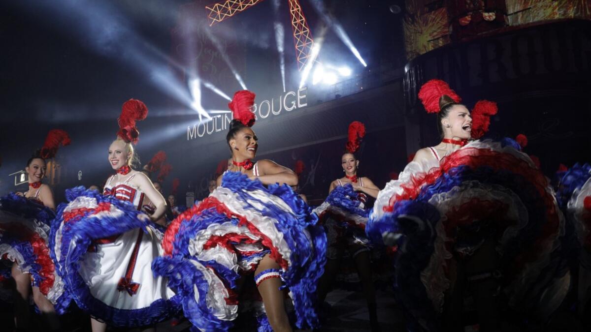 Moulin Rouge dancers perform during the celebration of the 130th anniversary of the French oldest cabaret, on October 6, 2019 in Paris.  GEOFFROY VAN DER HASSELT / AFP