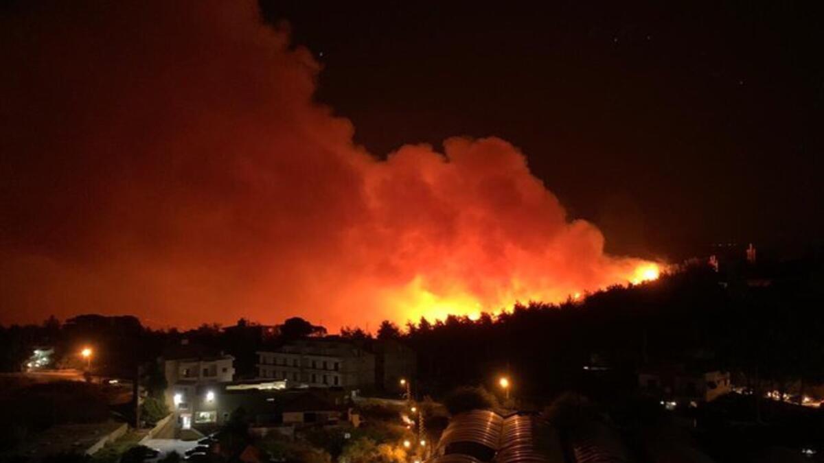 More than 100 firefighters from 20 Civil Defense stations cooperated with the Army to extinguish the massive fire. (Twitter)