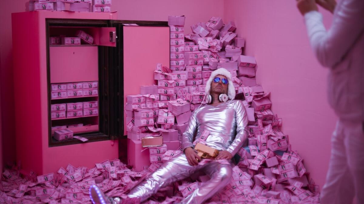 Manfred Dederl is being photographed at the "Supercandy Pop-Up Museum Vol. 2" in Cologne, western Germany on November 1, 2019. It is an interactive museum and offers a photo backdrop for social media at 25 stations. INA FASSBENDER / AFP