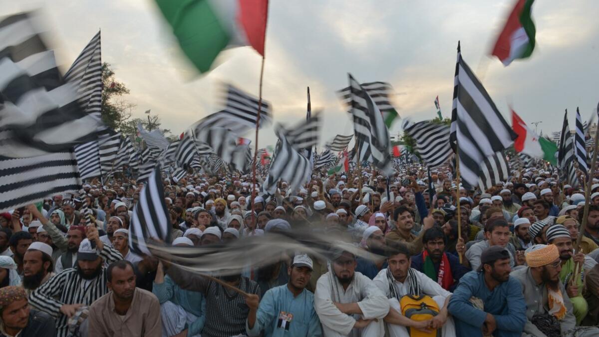 Activists of Islamic political party Jamiat Ulema-e-Islam (JUI) gather during an anti-government "Azadi (Freedom) March" in Islamabad on November 2, 2019. Tens of thousands of Islamists rallied alongside opposition supporters in Pakistan's capital Friday, as the firebrand cleric leading the protests called on Prime Minister Imran Khan's government to step down within 48 hours. FAROOQ NAEEM / AFP