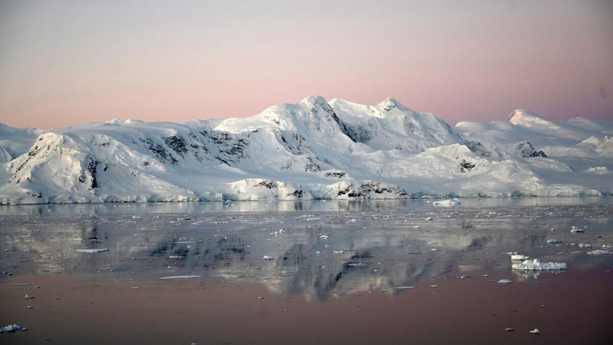 View of a glacier at sunset at Chiriguano Bay in South Shetland Islands, Antarctica on November 07, 2019. Johan ORDONEZ / AFP