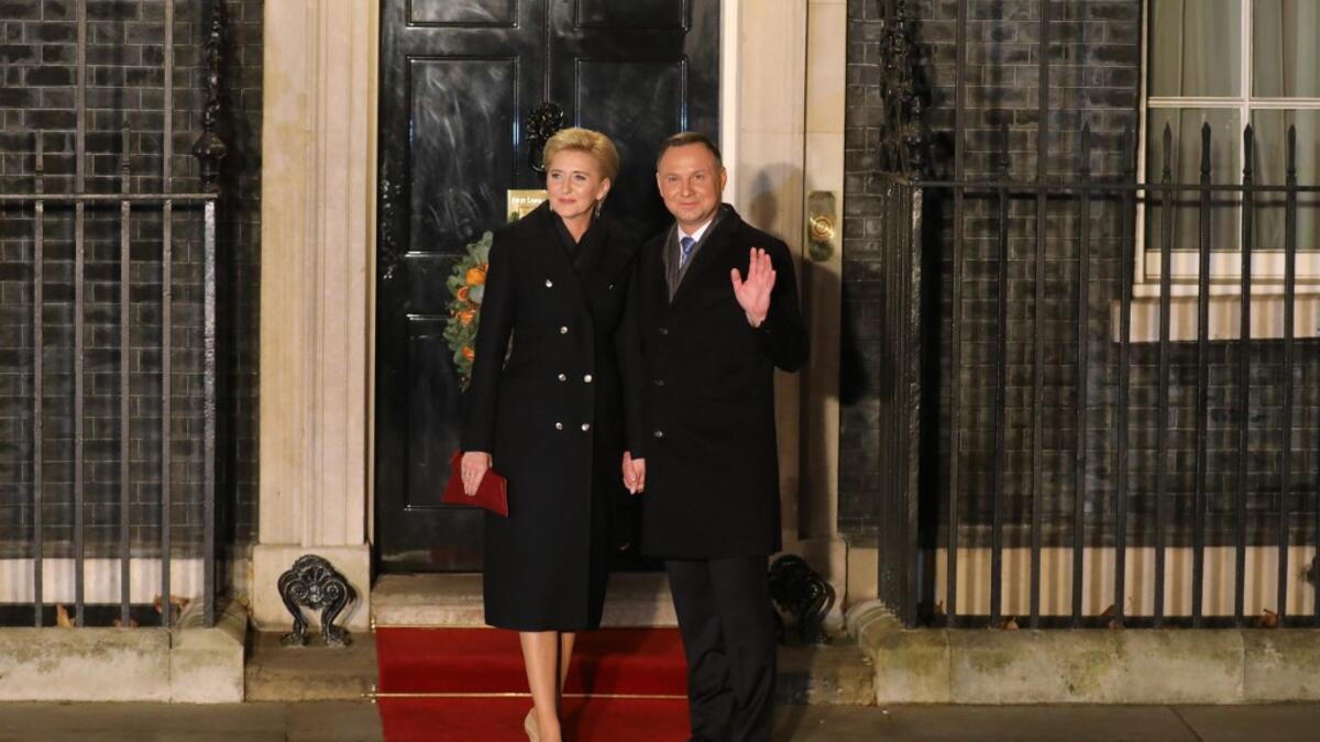 Poland's President Andrzej Duda (R) and wife Agata arrive at 10 Downing Street in central London on December 3, 2019, to attend reception hosted by Britain's Prime Minister Boris Johnson ahead of the NATO alliance summit. NATO leaders gather Tuesday for a summit to mark the alliance's 70th anniversary but with leaders feuding and name-calling over money and strategy, the mood is far from festive. LUDOVIC MARIN / POOL / AFP