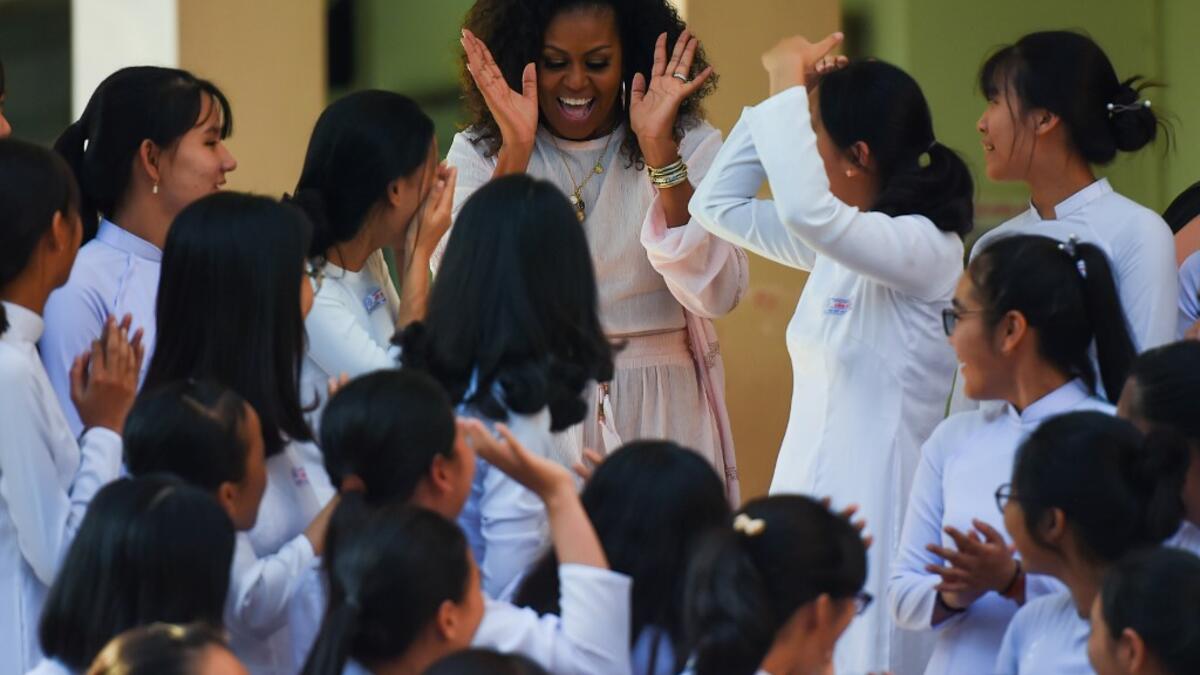 Former US First Lady Michelle Obama meets Vietnamese students in Can Giuoc district, Long An province on December 9, 2019. Michelle Obama and Julia Roberts visit to promote girls' education in Vietnam. Nhac NGUYEN / AFP