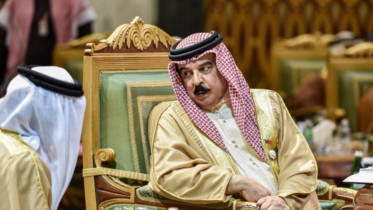 King Hamad bin Isa Al Khalifa of Bahrain, speaks with another delegate during the 40th Gulf Cooperation Council (GCC) summit held at the Saudi capital Riyadh on December 10, 2019. Fayez Nureldine / AFP