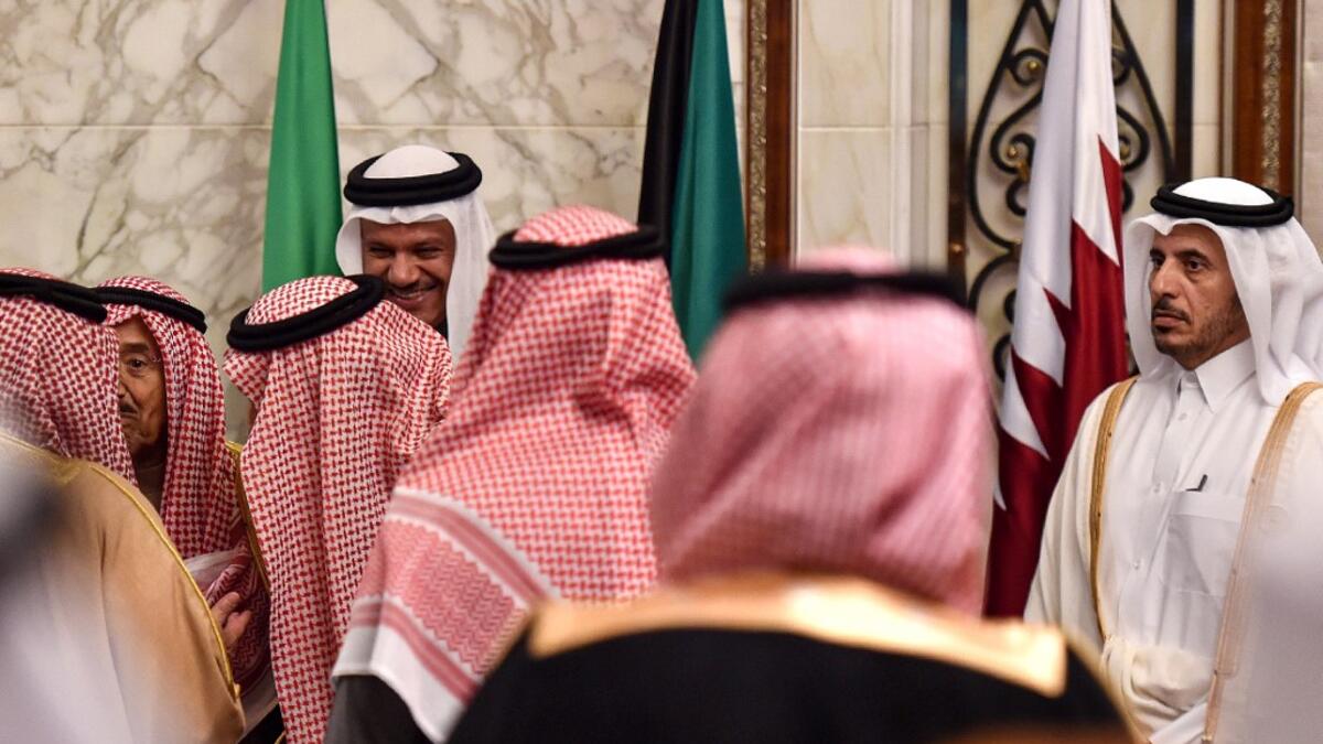 Abdullah bin Nasser bin Khalifa al-Thani (R), Qatar's Prime Minister, looks on as other delegates of the Gulf Cooperation Council (GCC) summit chat with each other, in the Saudi capital Riyadh on December 10, 2019. Fayez Nureldine / AFP