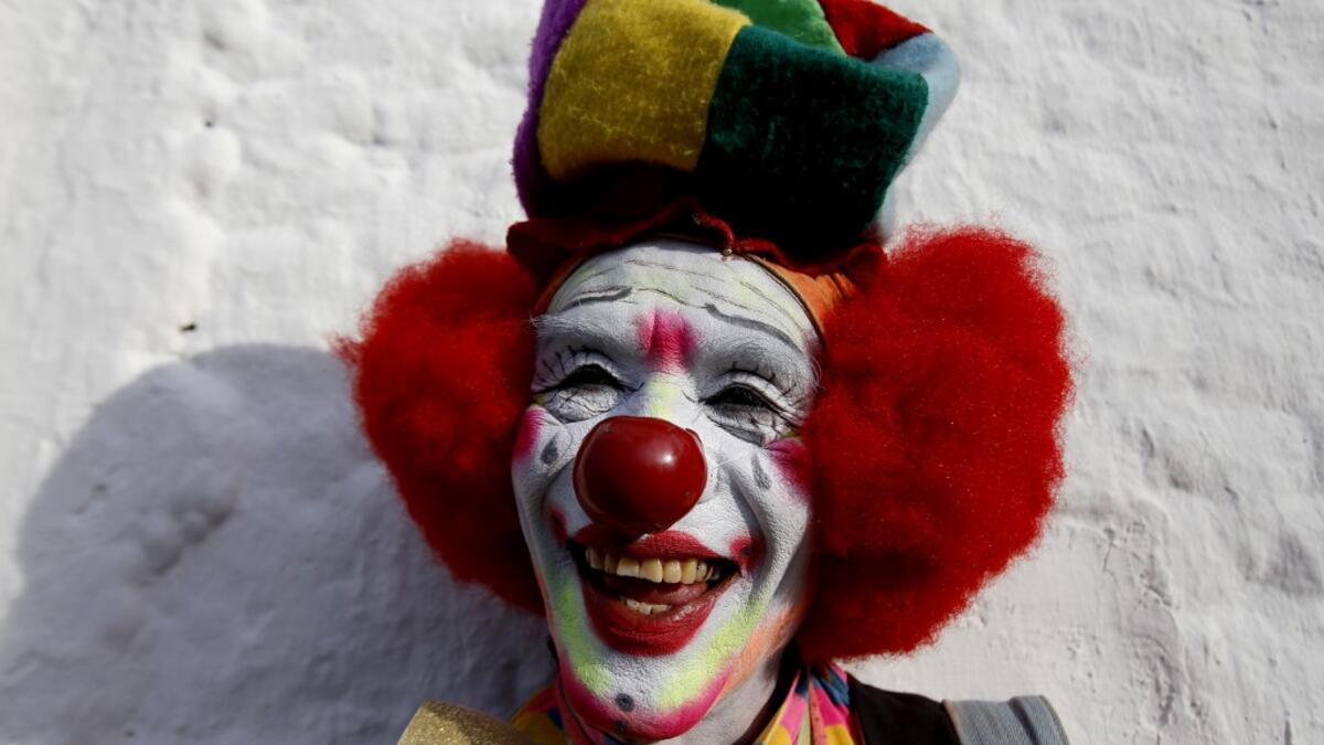 A clown pose for a picture during the International Clown Day in Guadalajara, Mexico, on December 10, 2019. Ulises Ruiz / AFP