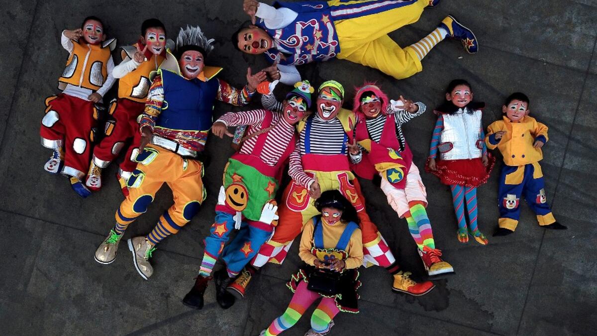 Clowns pose for a picture during the International Clown Day in Guadalajara, Mexico, on December 10, 2019. ULISES RUIZ / AFP